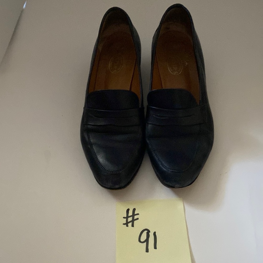 Navy blue loafers size 8 heel height 1 inch.